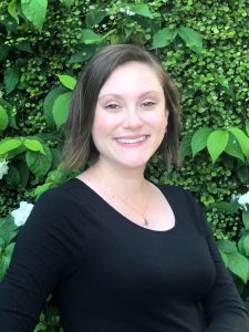 Picture of brunette woman in a black shirt - author Christina Davis